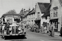 1953-Senior-Cup-Long-Melfords-players-coach-comes-down-Hall-street-