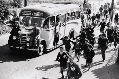 1953-Senior-Cup-Long-Melfords-supporters-run-alongside-the-player-bus-in-Southgate-street