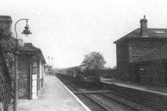 Long Melford Station platforms in 1955, the lamp in the foreground is on display at the Heritage Centre
