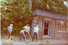Volunteers cleaning up the derelict station in 1970