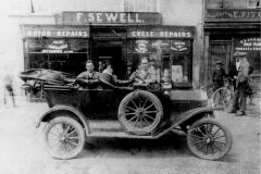 Frank-Sewell_s-Motor-_-Cycle-Shop-near-Cock-_-Bell-Lane-1920