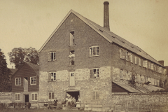 Whittles-Matting-factory-circa-1910-note-the-mats-hanging-on-rails-drying-after-being-dyed